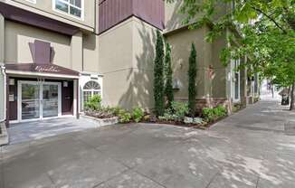 Front View of Apartment Building at Excalibur Apartment Homes, Bellevue, 98004