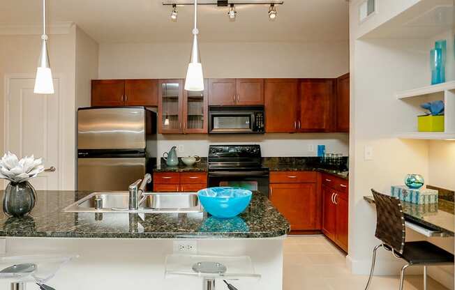 3000 Sage - Gourmet kitchen with modern fixtures and nearby built-in desk