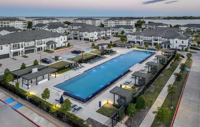 resort-inspired swimming pool at Reveal on the Lake apartments