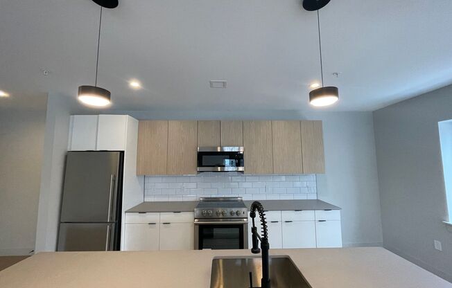 New construction condo available now!