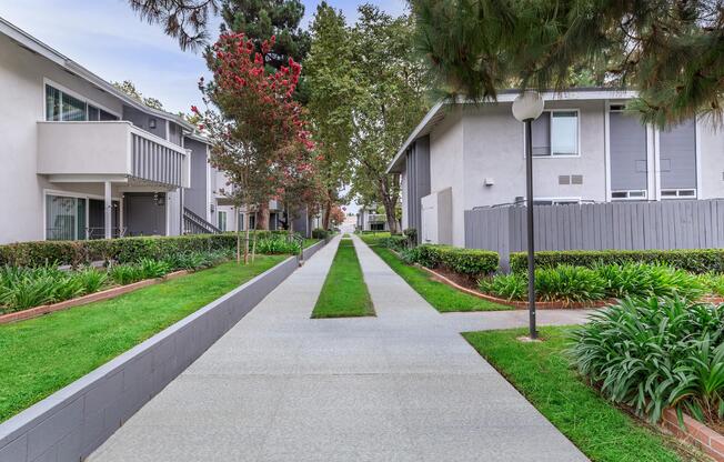 a house with a lawn in front of a building