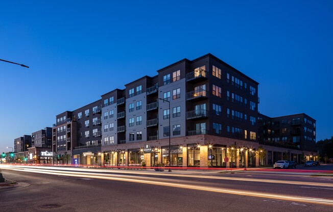 a large building with a street in front of it