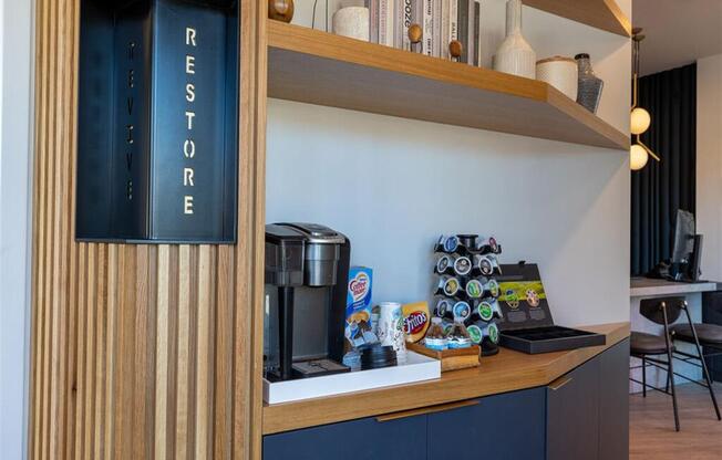 a coffee maker on a counter in a hotel room at The Preston at Hillsdale, San Mateo, California