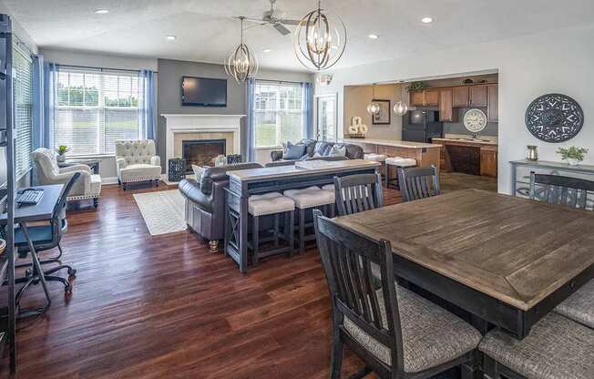 a living room filled with furniture and a fire place