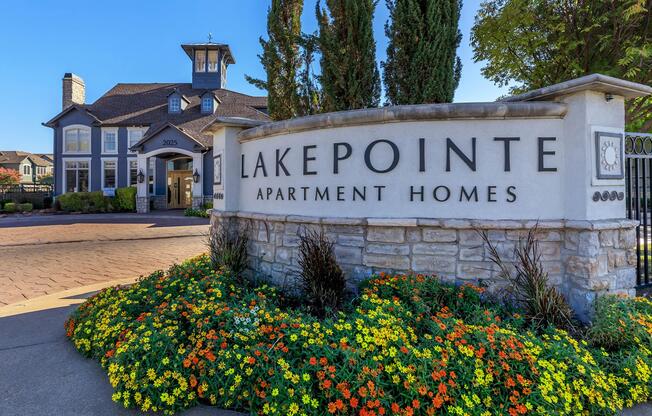 a house that has a sign on the side of a building