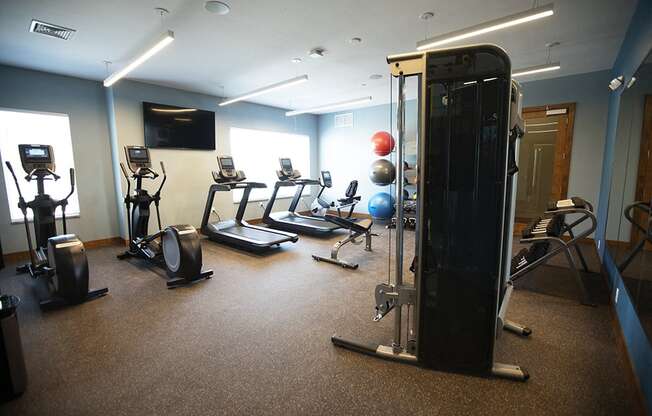 Fitness Center With Modern Equipment at Cedar Place Apartments, Wisconsin