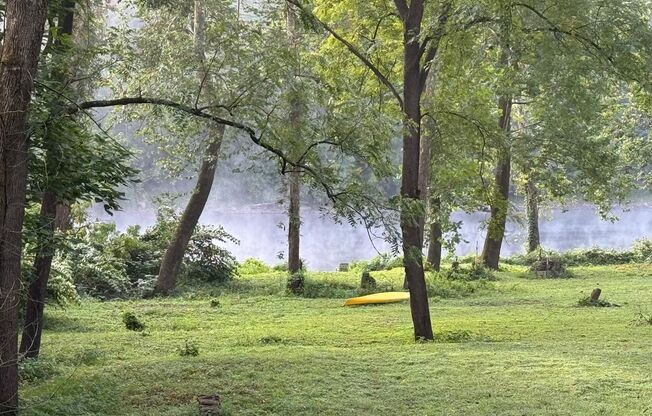 Riverfront home in a quiet spot, 3 acres, deck, parking, laundry, storage, fireplace
