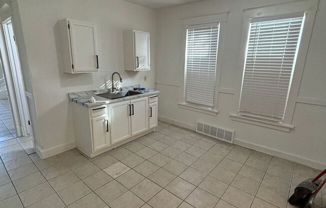 Spacious 6-Bedroom Home with Modern Updates in Franklin Heights