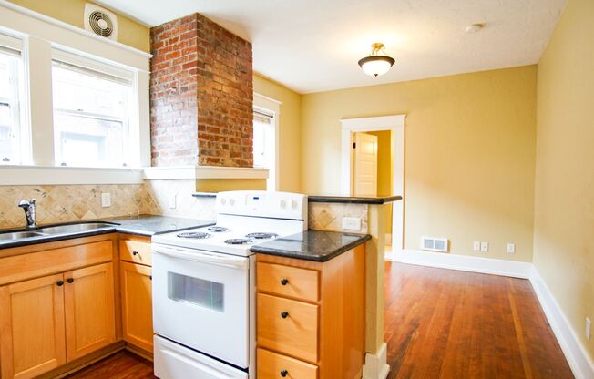 Stunning Top Floor 1-Bed with Exposed Brick + Old-World Charm!