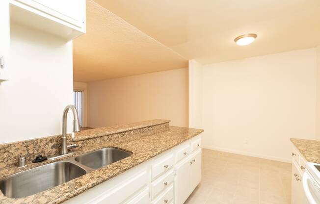 Kitchen with White Appliances and White Cabinets