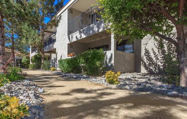 Sagecliff Apartments Shaded Walkway and Landscaping
