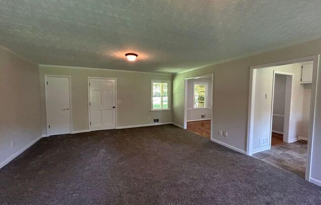 488 Dogwood Trail: 3BD, 2BA ranch home on large lot. Perfectly located just off the intersection of Hwy 74 and Dogwood Trail in Tyrone. Newer Flooring, Newer Paint, Newer Light Fixtures! AVAILABLE NOW!