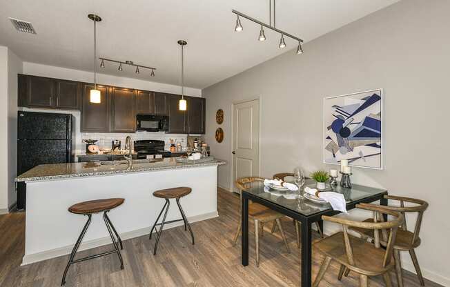 Model Dining Room at  Dunedin Commons Apartment Homes in Dunedin, Florida, FL