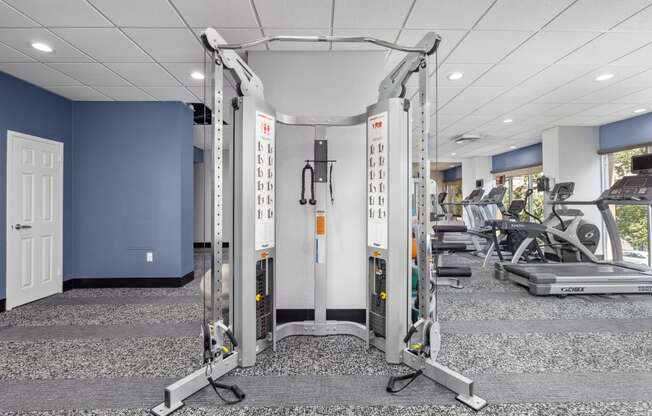 a photo of a fitness room with exercise equipment