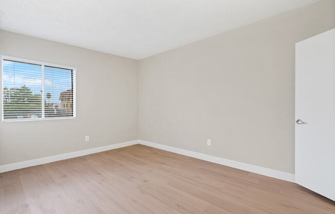 Bedroom with Carpet and Windows at Verde Apartments, Tucson, AZ