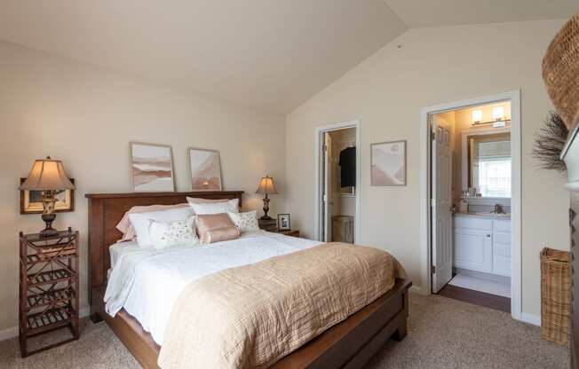 This is a photo of the primary bedroom in the 1016 square foot, 2 bedroom, 2 bath Nautica floor plan at Nantucket Apartments in Loveland, OH.