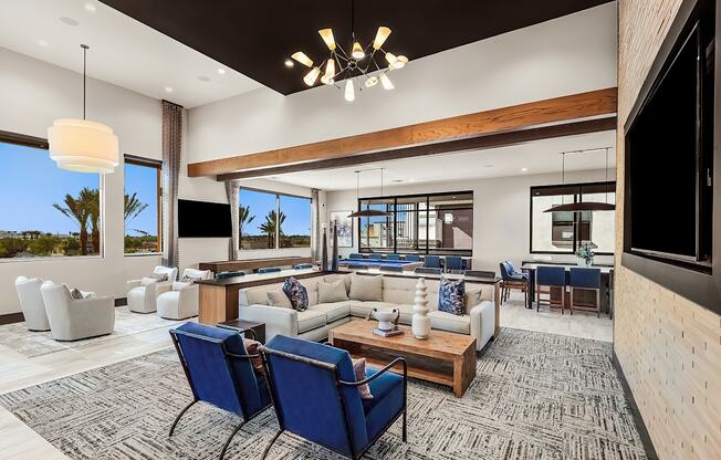 A modern living room with a large window and a view of the outdoors.