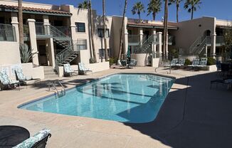 East side condo with community pool/spa/assigned covered parking place