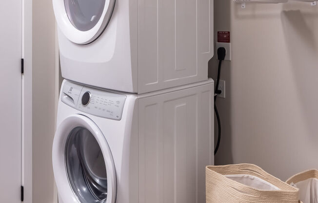 a washing machine and dryer in a laundry room