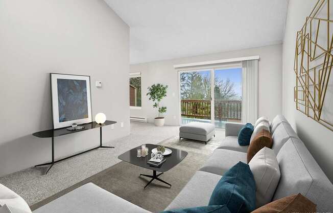 A modern living room with a grey sofa, a black coffee table, and a large window.