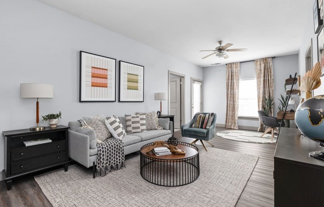 a living room with a couch and a coffee table at the Vue apartments in Indianapolis