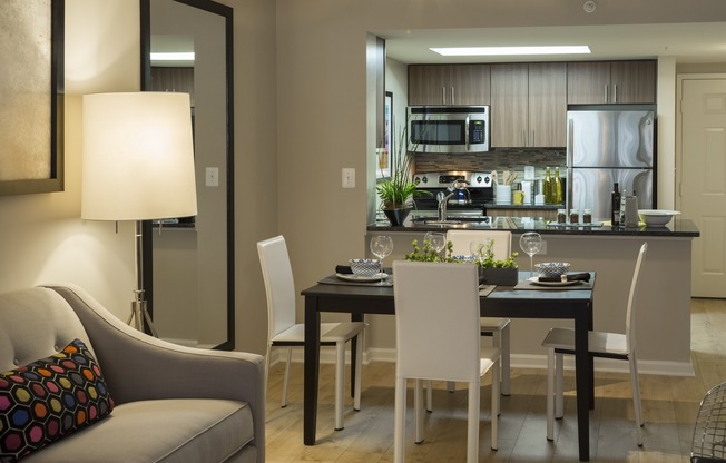 Renovated Apartments With Granite Countertops, Wood-Style Flooring and Stainless Steel Appliances