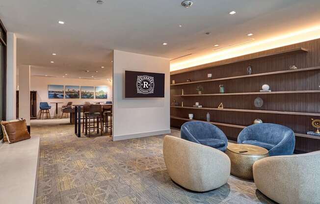 A room with a carpeted floor and a long wooden shelf.