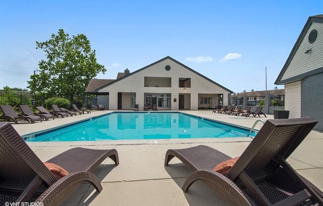 our apartments have a large pool and lounge chairs