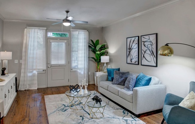 a living room with a couch and a chair