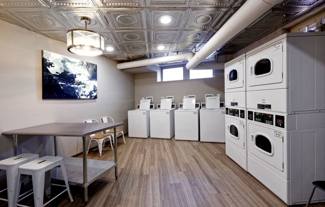 Laundry room with seating area at 4115 Wisconsin, Washington