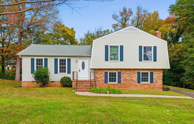 A split-level 4-bedroom, 3 full bath home in Gardner Park of Gastonia!
