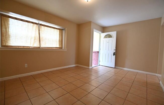 Cozy & Updated 3-Bedroom Home with Oversized Backyard Near Downtown!