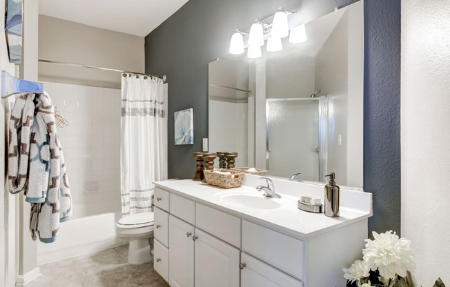 a bathroom with a sink and a shower and a toilet at MetroPlace at Town Center, Maryland, 20746