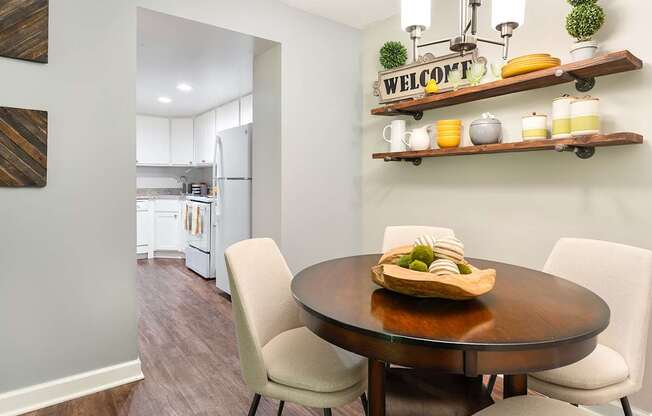Convenient dining area offset from the kitchen, offering a functional and flexible layout.