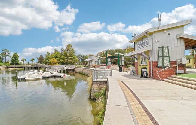 a building with a boat dock on the water