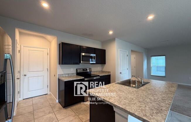 Spacious & Modern 4-Bedroom Home with Large Backyard!