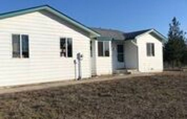 2 bedroom home with Shop and Acreage