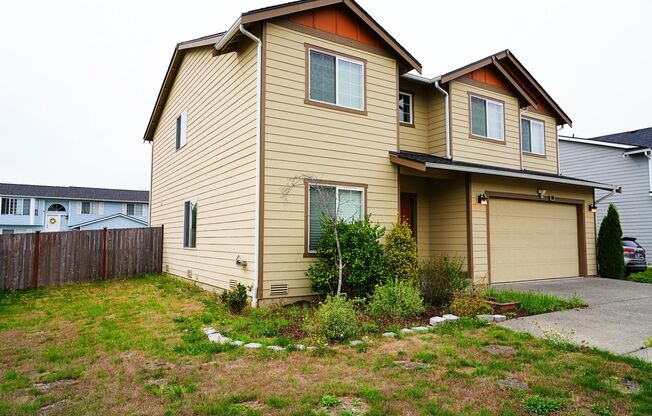 Spacious move in ready 5+bedroom 2.5-bathroom house in a desirable Tacoma area!