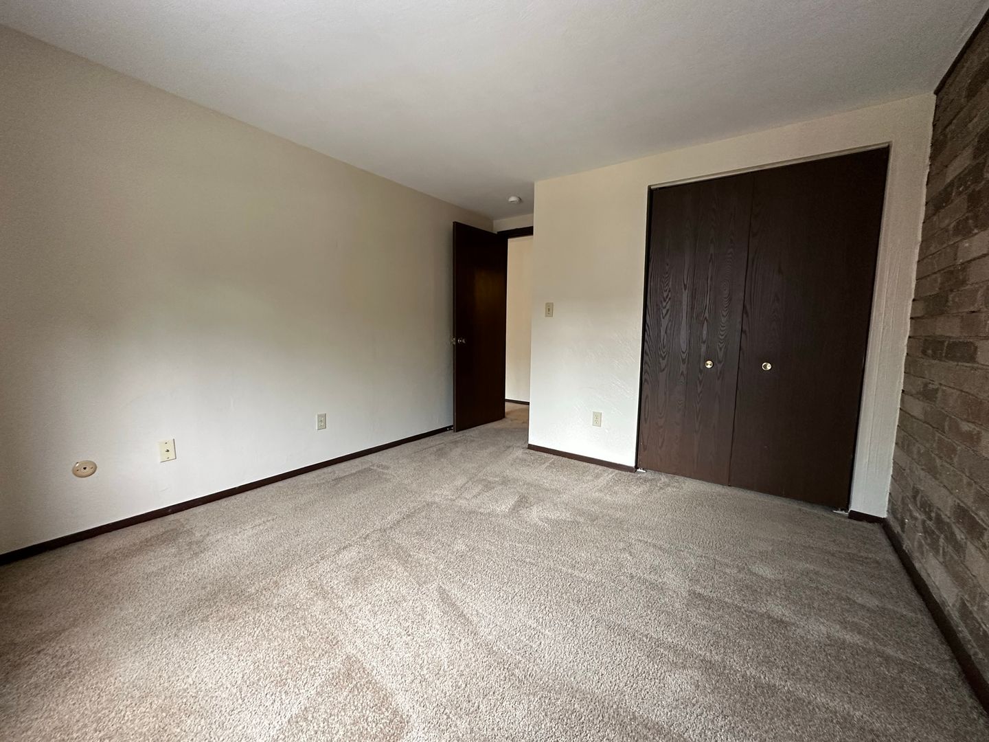 Cozy One Bedroom with Beautiful Exposed Brick! Off-Street Parking & Laundry Included!