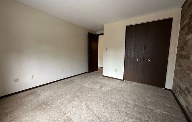 Cozy One Bedroom with Beautiful Exposed Brick! Off-Street Parking & Laundry Included!