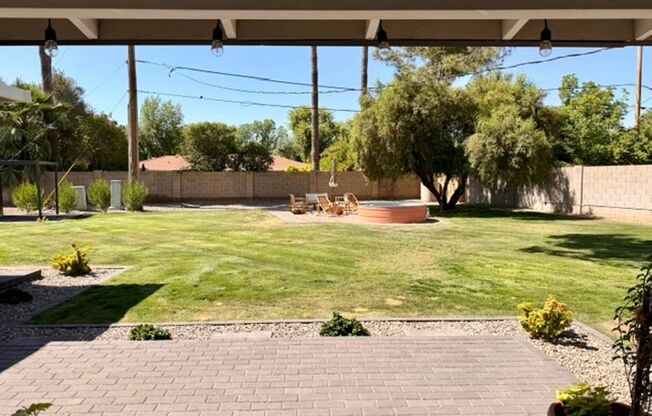 Updated Central Phoenix 3 bed, 2 bath with open layout, stainless steel appliances, and large irrigated backyard near Downtown and light rail.