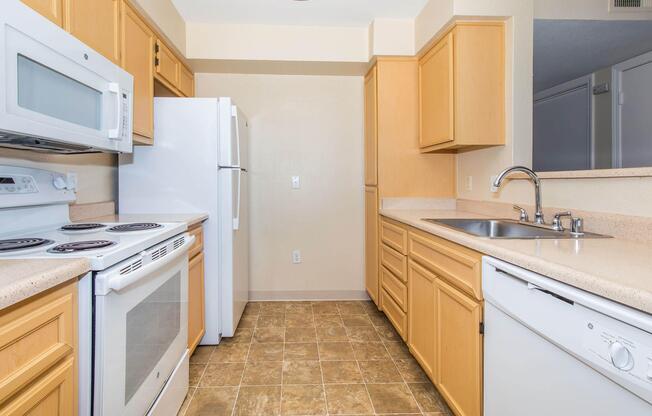 a kitchen with a stove top oven