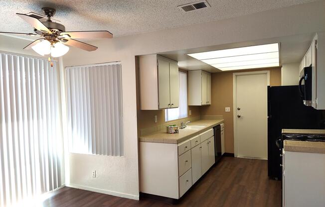 a kitchen with a table in a room