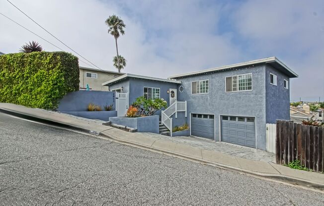 VERY CHARMING, BRIGHT & AIRY HILLTOP HOME W/ CITY VIEWS, SPACIOUS FENCED FRONT PATIO, LARGE REAR YARD & GARAGE W/ 1-CAR PARKING & BONUS SPACE NEAR PARKS, SCHOOLS & 5 MINS TO BEACH!