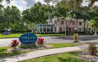 Monument signs and gated entrance to Terraces at Clearwater Beach Apartment Homes at Terraces at Clearwater Beach, Clearwater, FL, 33756