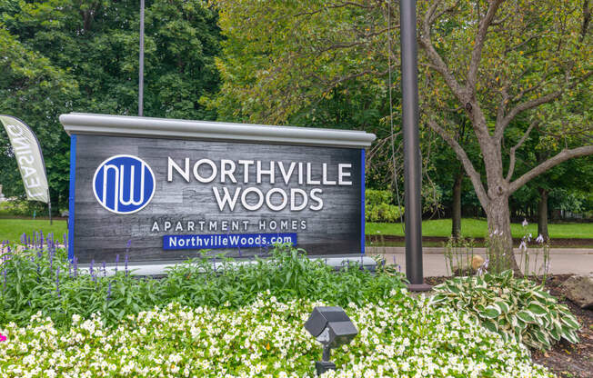a sign for northville woods apartment homes