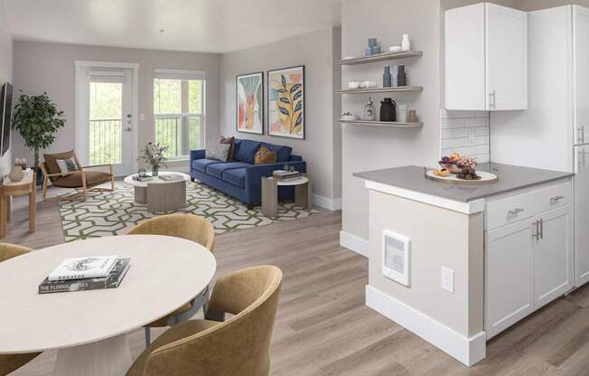 A modern kitchen with a dining table and chairs.