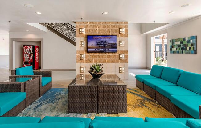 a living room filled with furniture and a flat screen tv