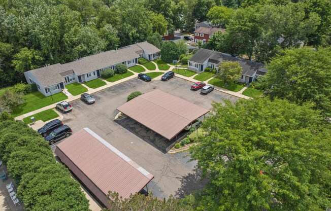 an aerial view of a neighborhood with houses and trees