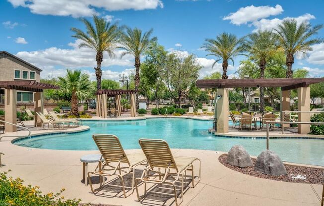 Charming 3 Bed + Den 2.5 Bath Home with 2 car attached EV garage with community pool !!